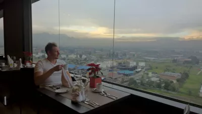 How To Become A Digital Nomad? 25 Expert Tips : Digital nomad in Bogota taking coffee in hotel before remote work day